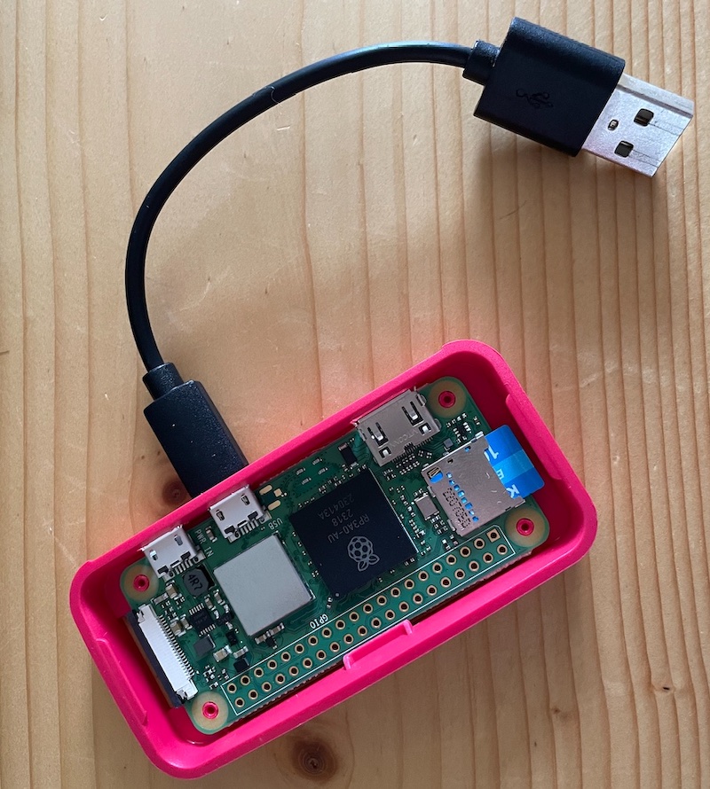 Raspberry Pi Zero, with USB OTG + fashionably short USB cable